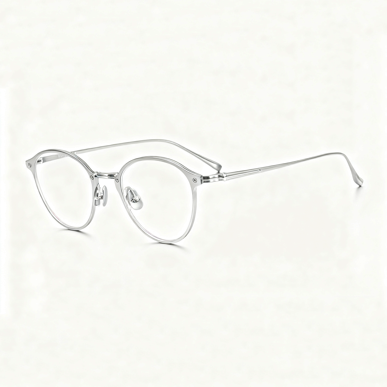 Monturas de gafas de metal ultratransparentes de titanio puro de estilo retro elegante y ejecutivo unisex, disponibles en tres colores.